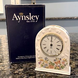 At sled Cottage Garden Mantel Clock